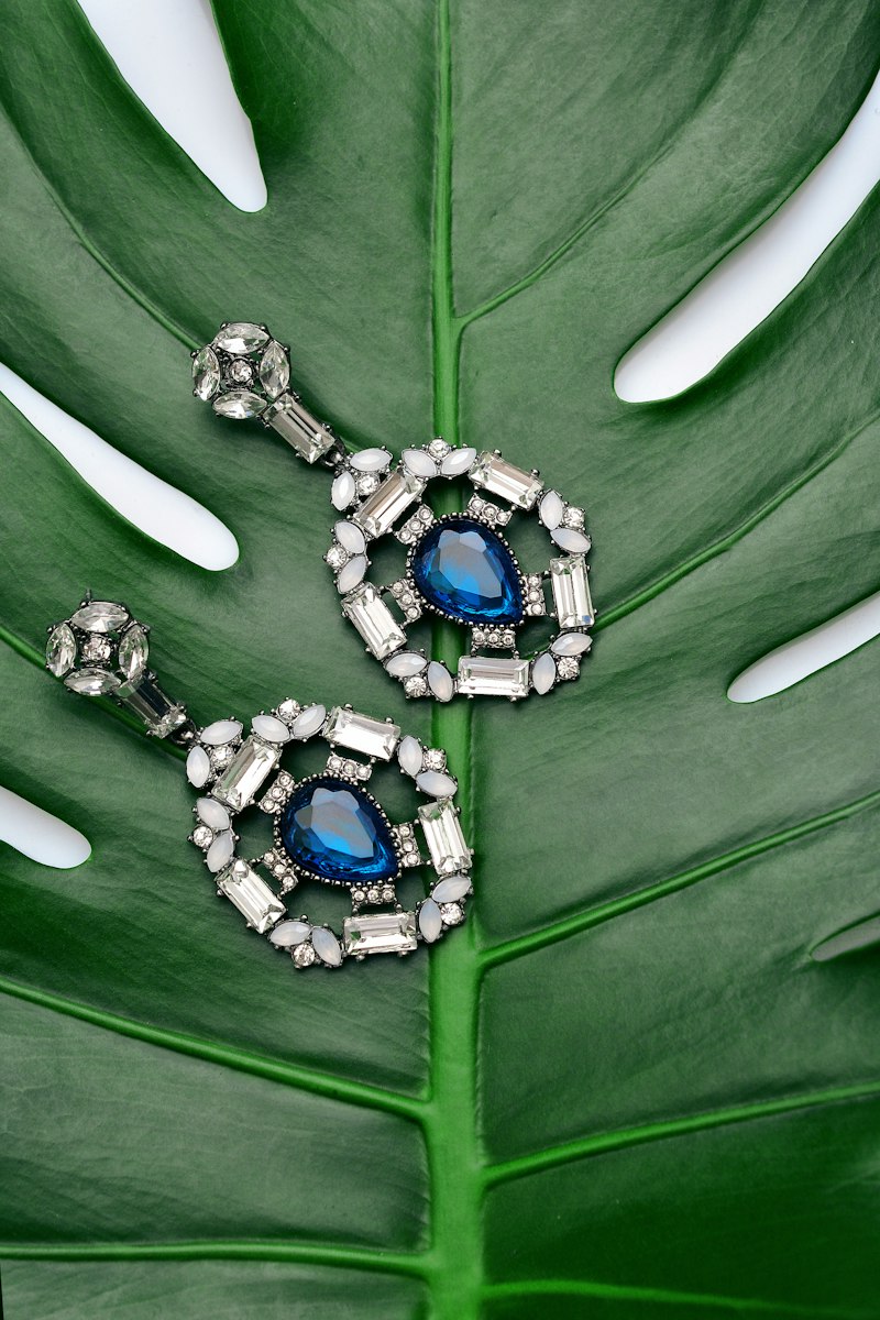 Bridal accessories, kundan jewelry sets, clutches, and dupattas